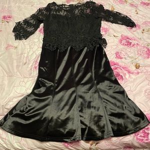 Lace and satin black cocktail dress.